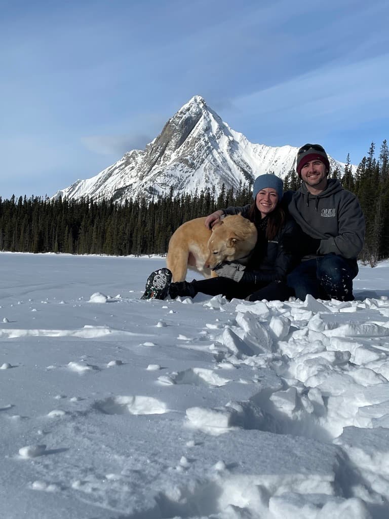 family photo in snowy mountain valley